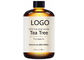 Gli oli essenziali puri organici, olio naturale dell'albero del tè lenisce i difetti delle radure della pelle
